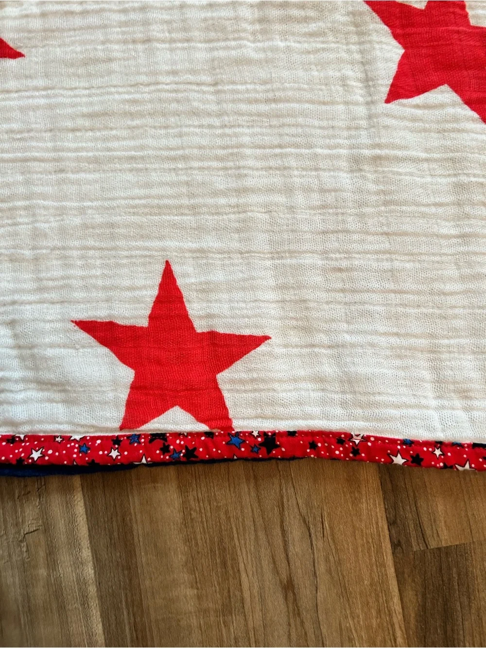 aden + anais Red Star Muslin Baby Blanket on White